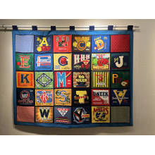 52" x 62" fabric collage wall hanging based on vintage fruit crate labels.